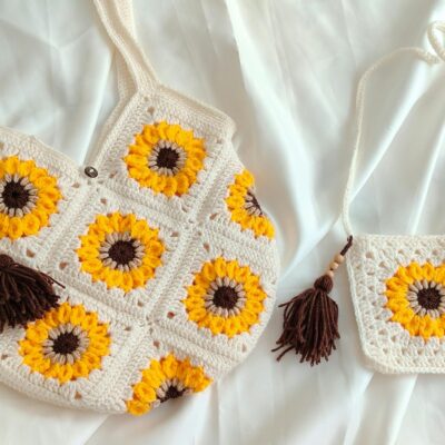 Elegant crochet bags featuring vibrant sunflower patterns. Perfect for fashion enthusiasts.